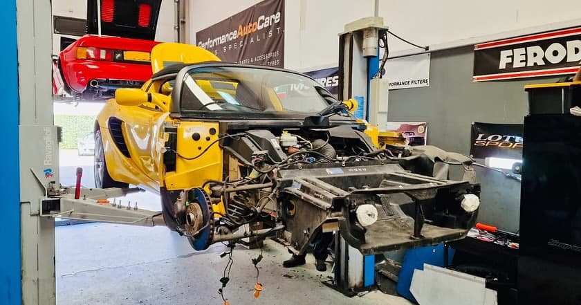 Yellow Elise in Performance Autocare Workshop